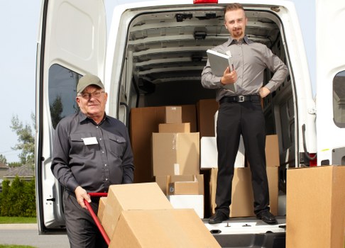 Removal van and movers preparing a house move in Richmond upon Thames
