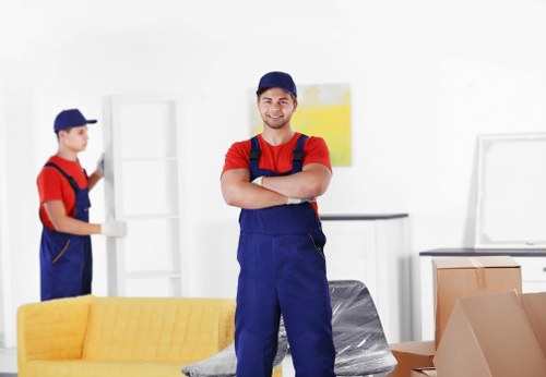 Moving furniture through a flat building in Richmond upon Thames