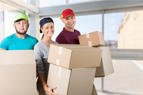 Loading furniture into a moving truck in Richmond upon Thames