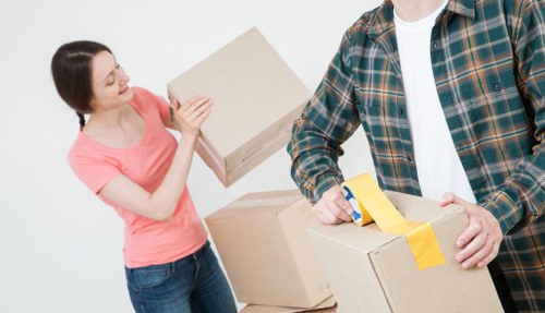 Careful packing and box handling during a local home removal service