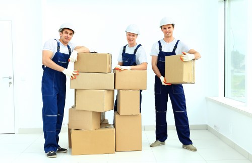 Careful wrapping of fragile household items for packing and unpacking services