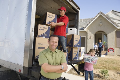 Professional movers handling office furniture relocation