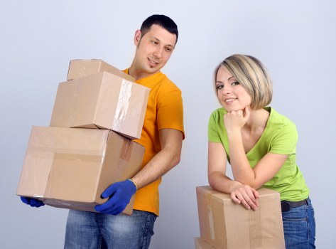 Removal team planning a safe move with protective packing materials