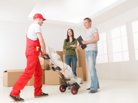 Unpacking service helping a family settle into a new home