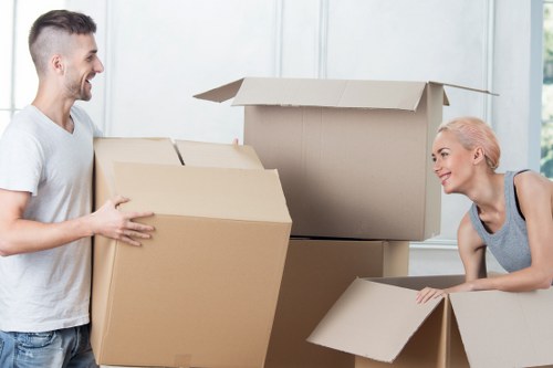 Careful packing for house removals in Richmond upon Thames with labelled boxes