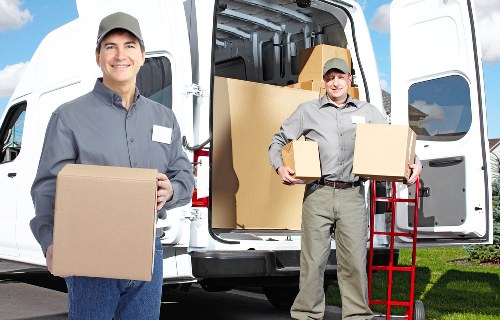 Careful lifting of household furniture in a local Richmond property