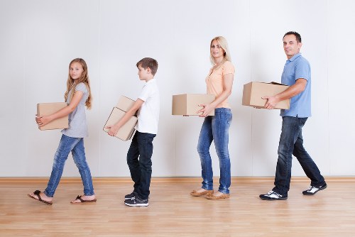 Packed boxes and household items prepared for moving day