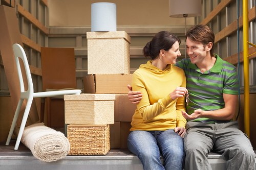 Cardboard, furniture, and household items prepared for charity donation and recycling