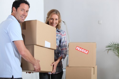 Packed moving boxes and clear walkways in a safe loading area