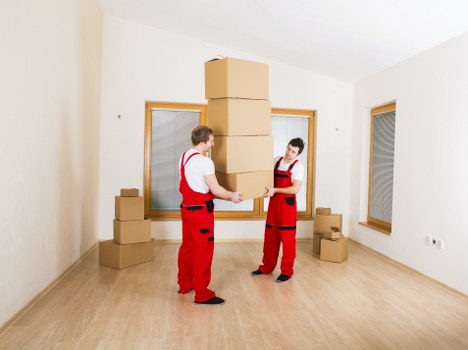 Moving van loading items from a Richmond property