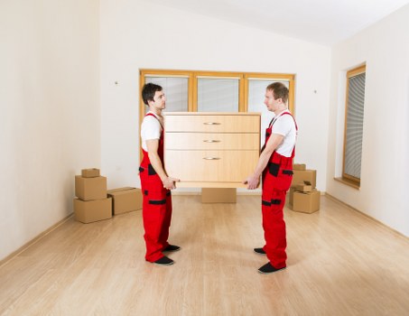 Packed boxes and furniture ready for transport in a removals van