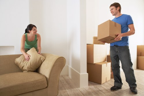 Commercial move packing and furniture setup at a new workplace